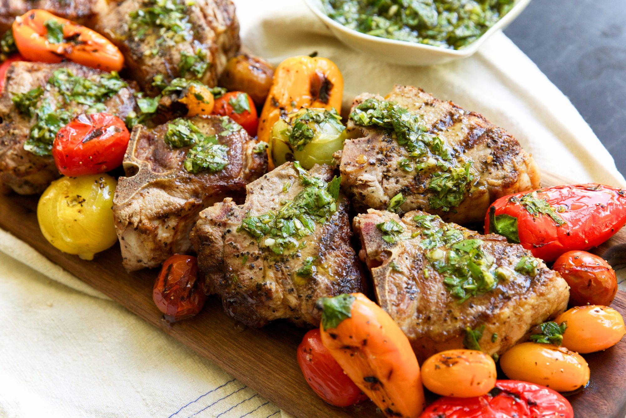 Grilled Lamb Loin Chops & Tri-colored Mini Sweet Peppers and Cherry Tomato Medley with Chimichurri Sauce